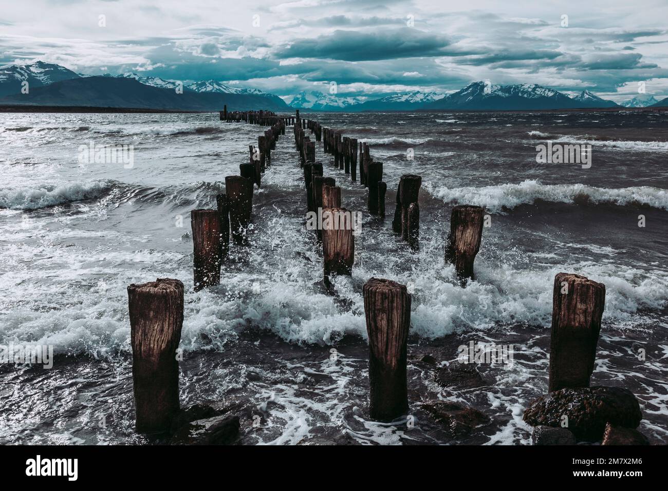 The remains of an old pier, now a resting place for seabirds. Puerto Natales, Chilean Patagonia. Stock Photo