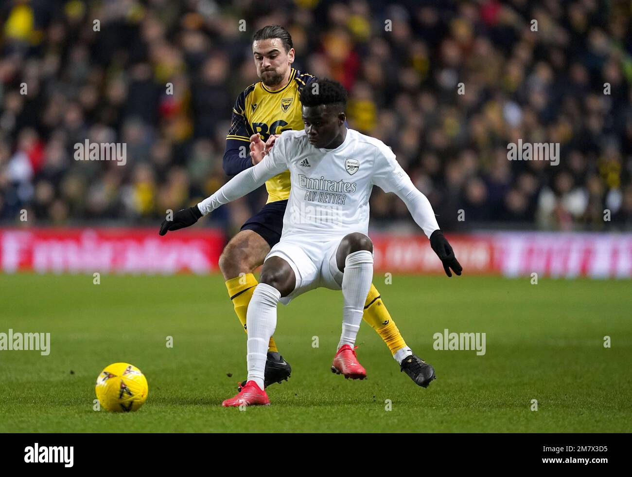 Oxford United's Ciaron Brown and Arsenal's Bukayo Saka (right Stock ...