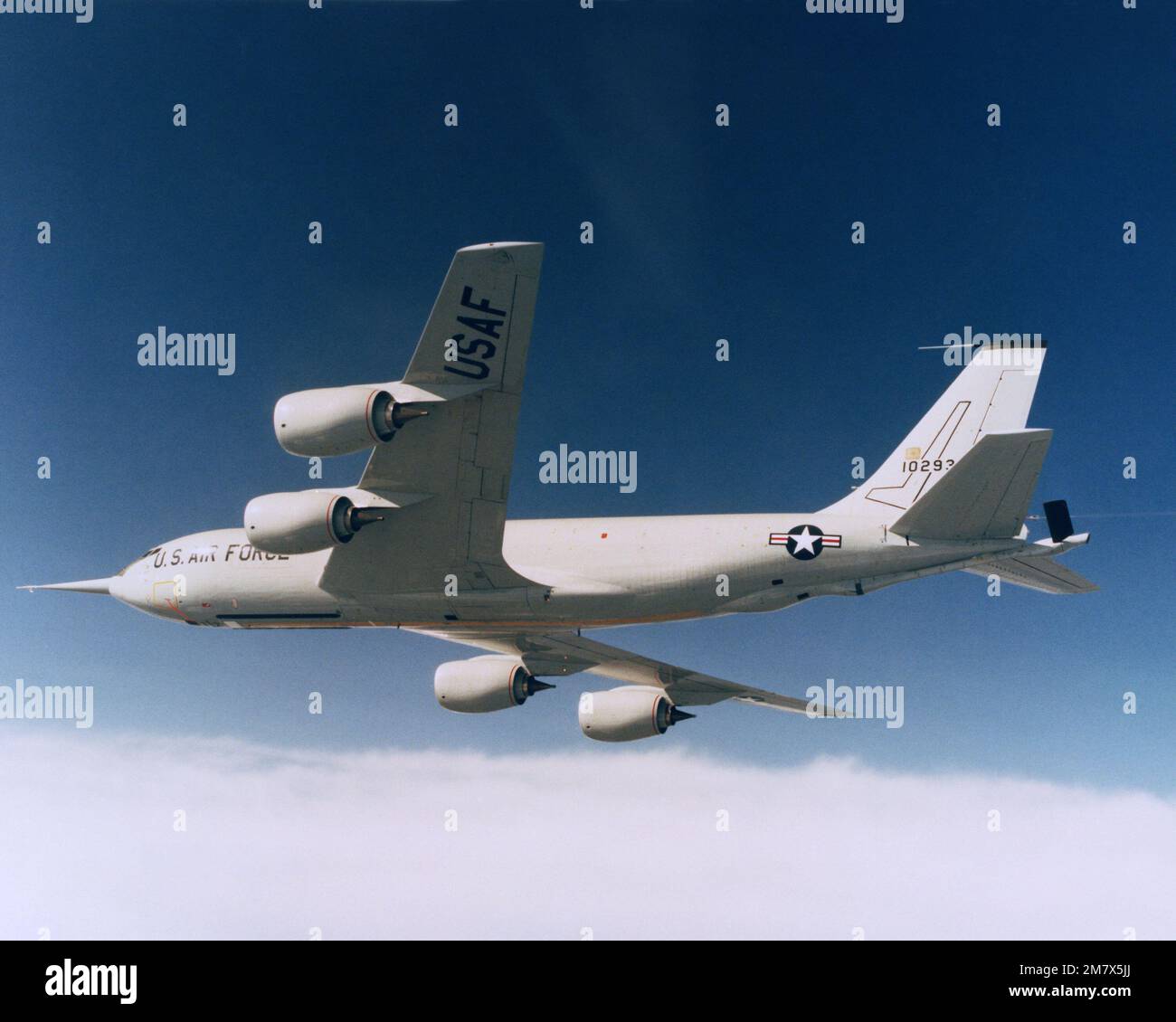 An air-to-air left side view of a re-engined KC-135R Stratotanker ...