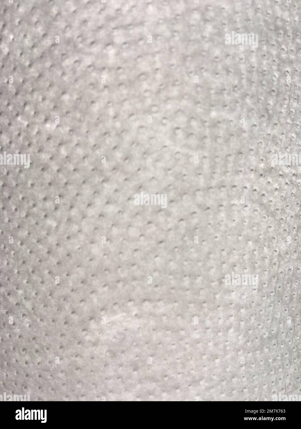 Abstract Close-Up of White Textured Material with Repetitive Pattern Stock Photo