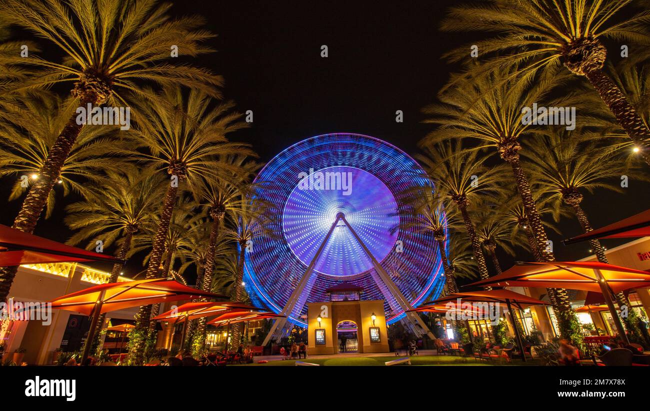 A Long Exposure of the blue illuminated Ferris wheel at the Irvine