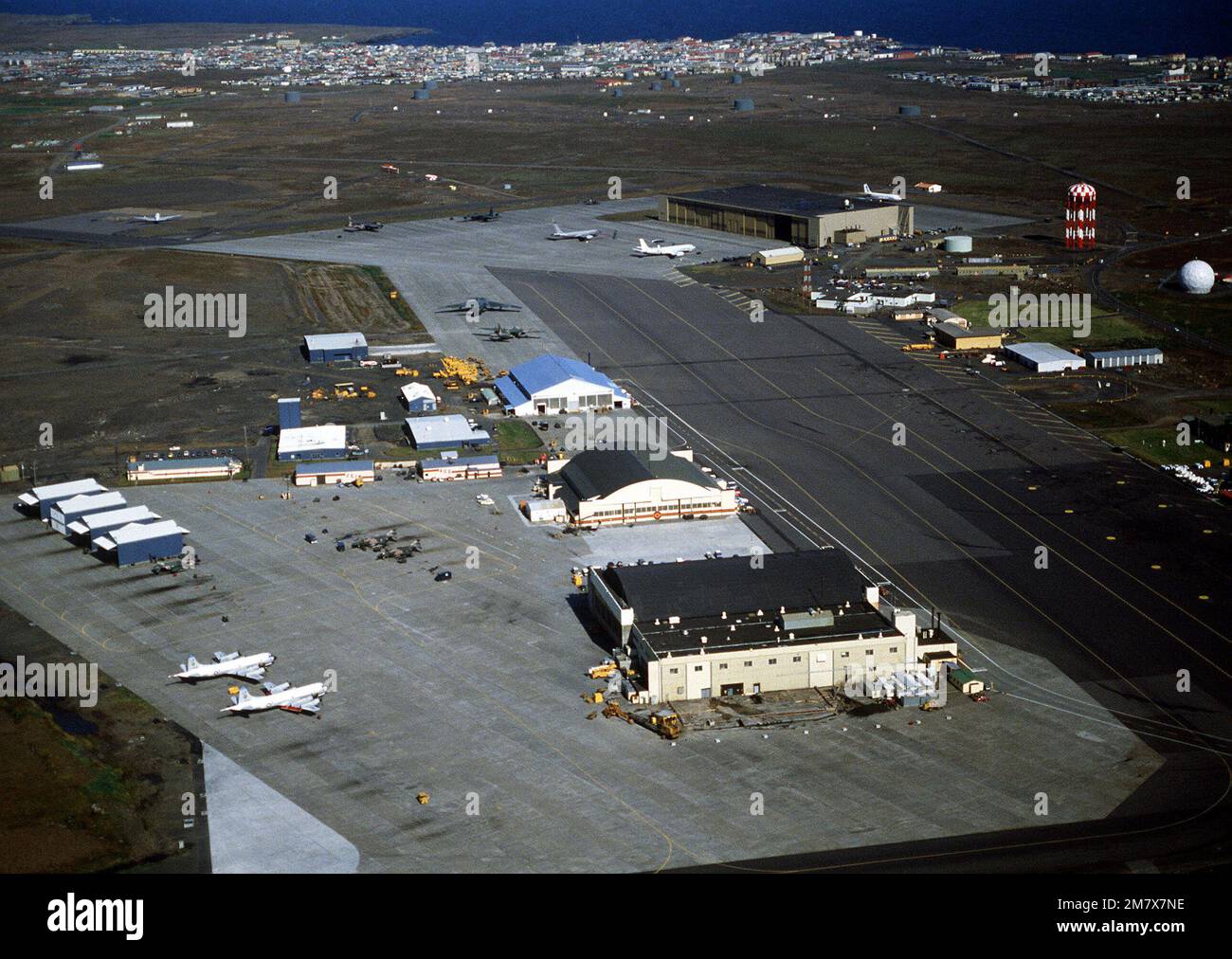 An aerial view of the ramp areas and facilities of the 57th Fighter