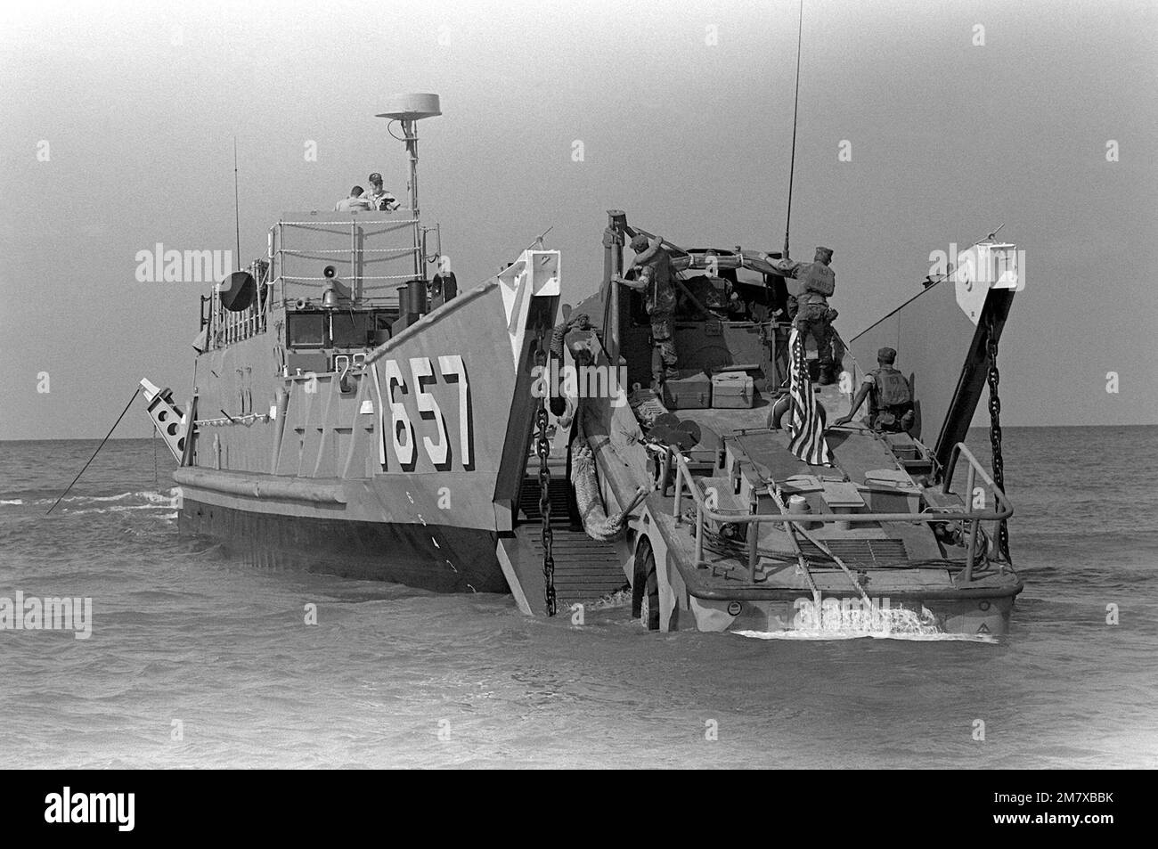 U.S. Marines drive a lighter amphibious resupply cargo vehicle (LARC-V) aboard utility landing craft 1657 (LCU-1657). U.S. Marines have been assigned to Lebanon as part of a multinational peacekeeping force after a confrontation between Israeli forces and the Palestine Liberation Organization. Base: Beirut Country: Lebanon (LBN) Stock Photo