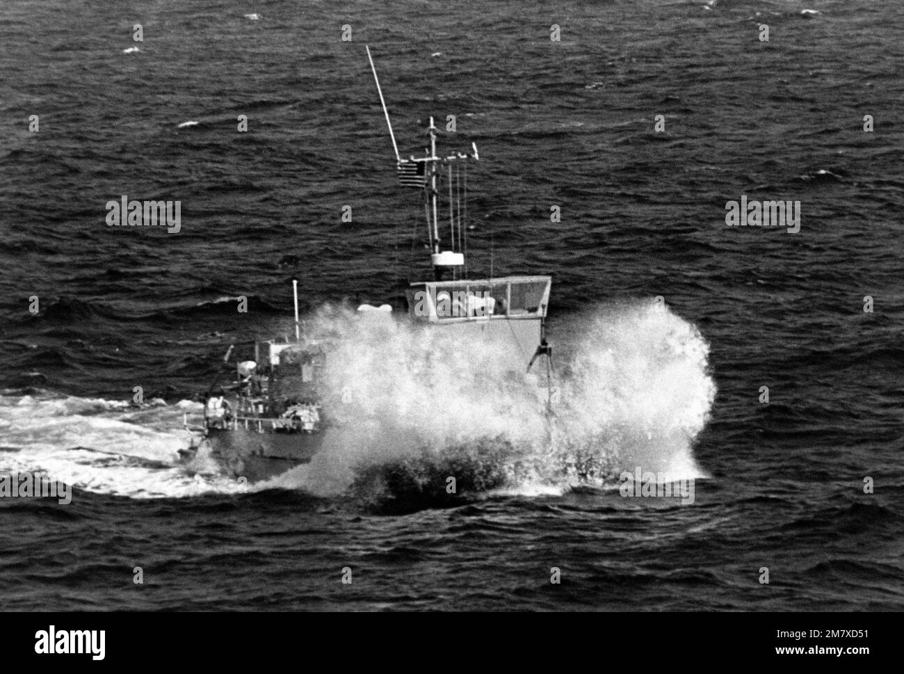 A starboard bow view of a minesweeping boat (MSB) as it moves through ...