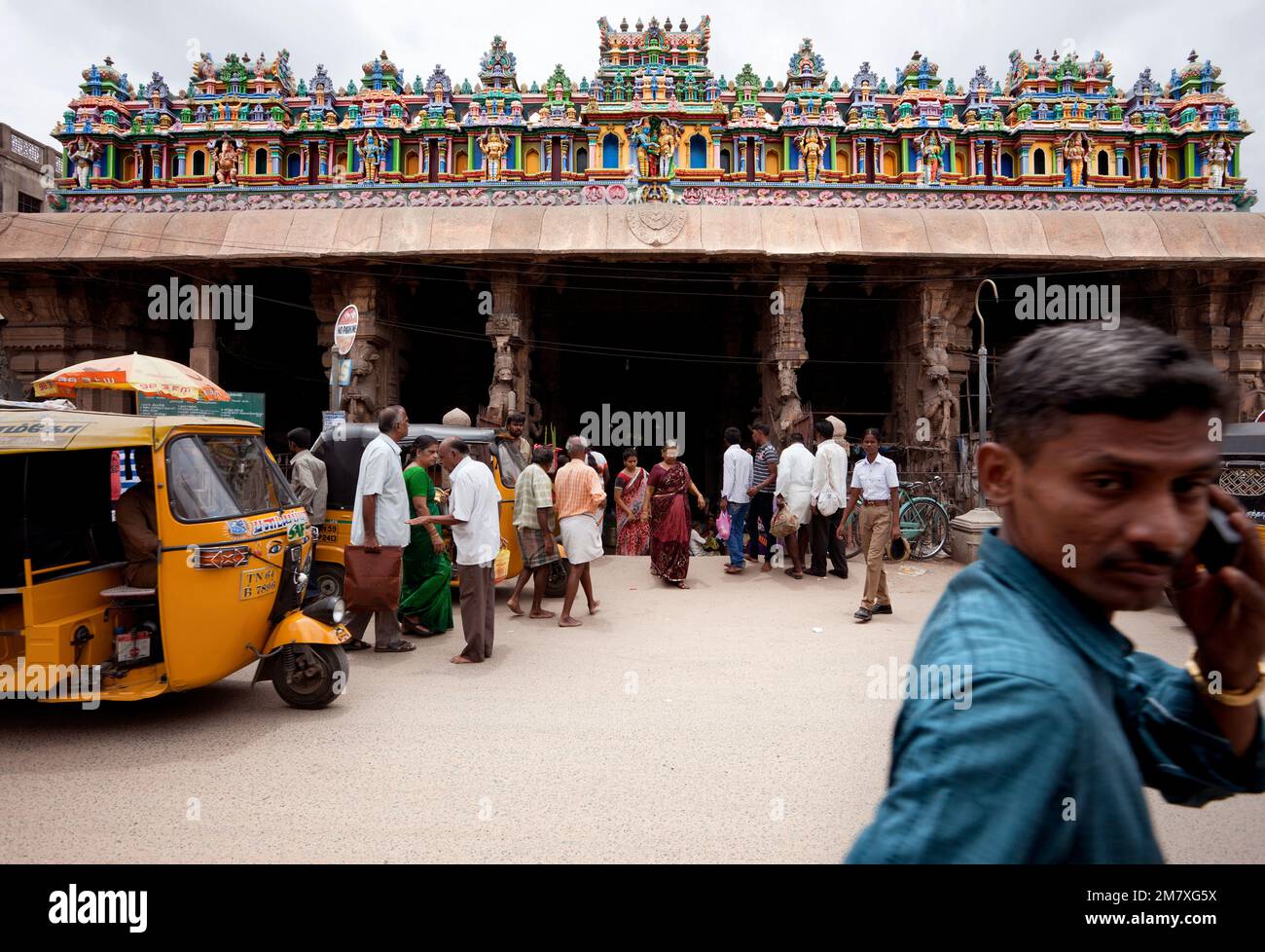 Madurai, India-September 11, 2012. A street in front of the the Sri Meenakshi Hindu Temple where many parishioners and pilgrims visit every day. Stock Photo