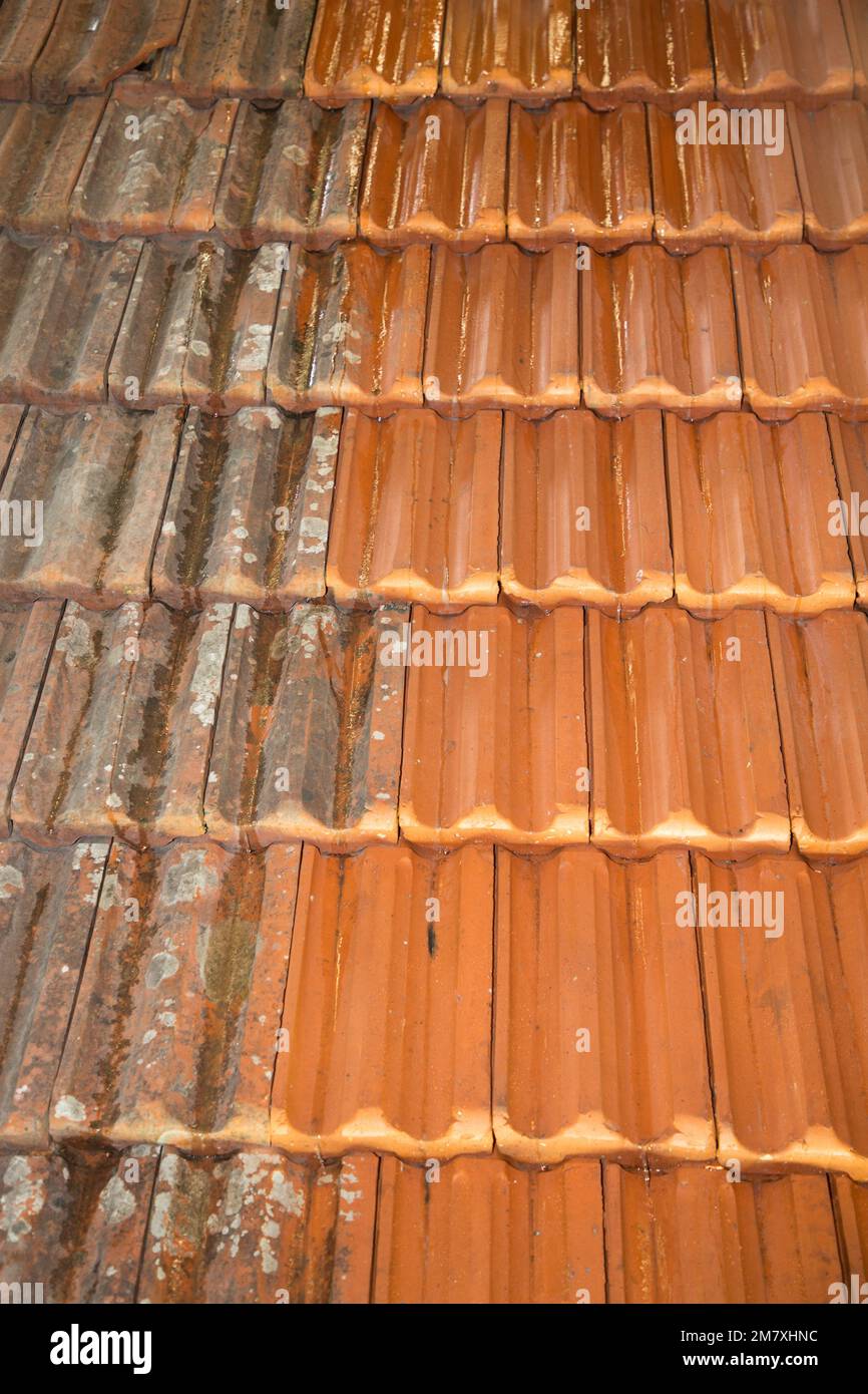 Washing the roof House before and after dirty comparison Stock Photo