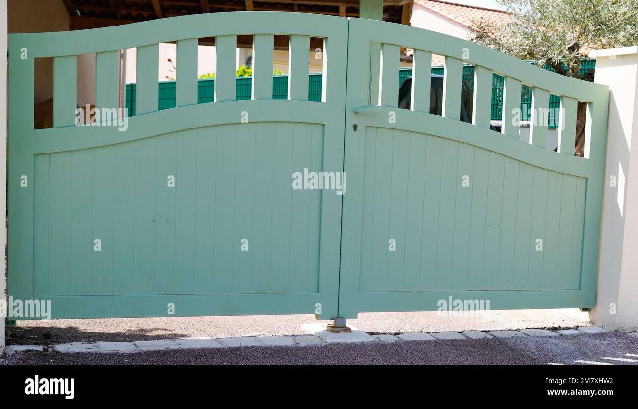 steel green clear metal gate fence on modern house Stock Photo Alamy