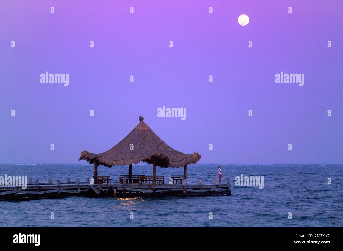 Mexico, Yucatan Peninsula, Caribbean, Riviera Maya, pier and moon Stock Photo