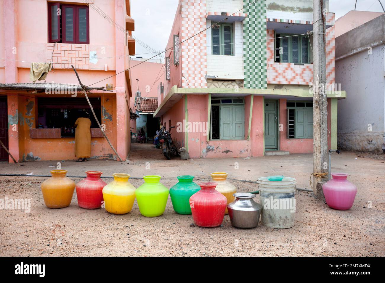 Kanyakumari, India-September 9, 2012. several jugs placed in a row, keep the order in which they will be filled with water in the town, as there is no Stock Photo