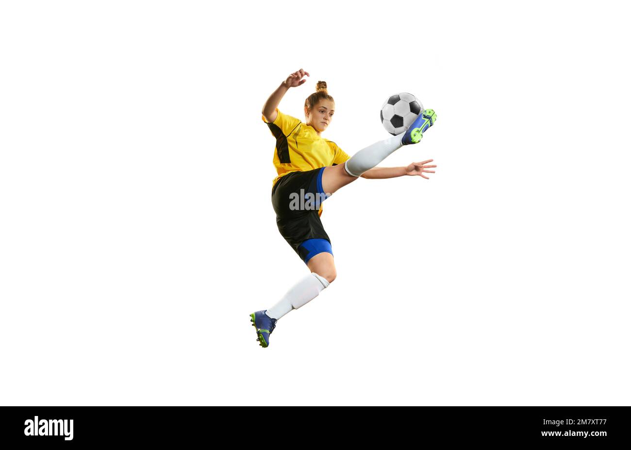 Goalkeeper. Young professional female football, soccer player in motion
