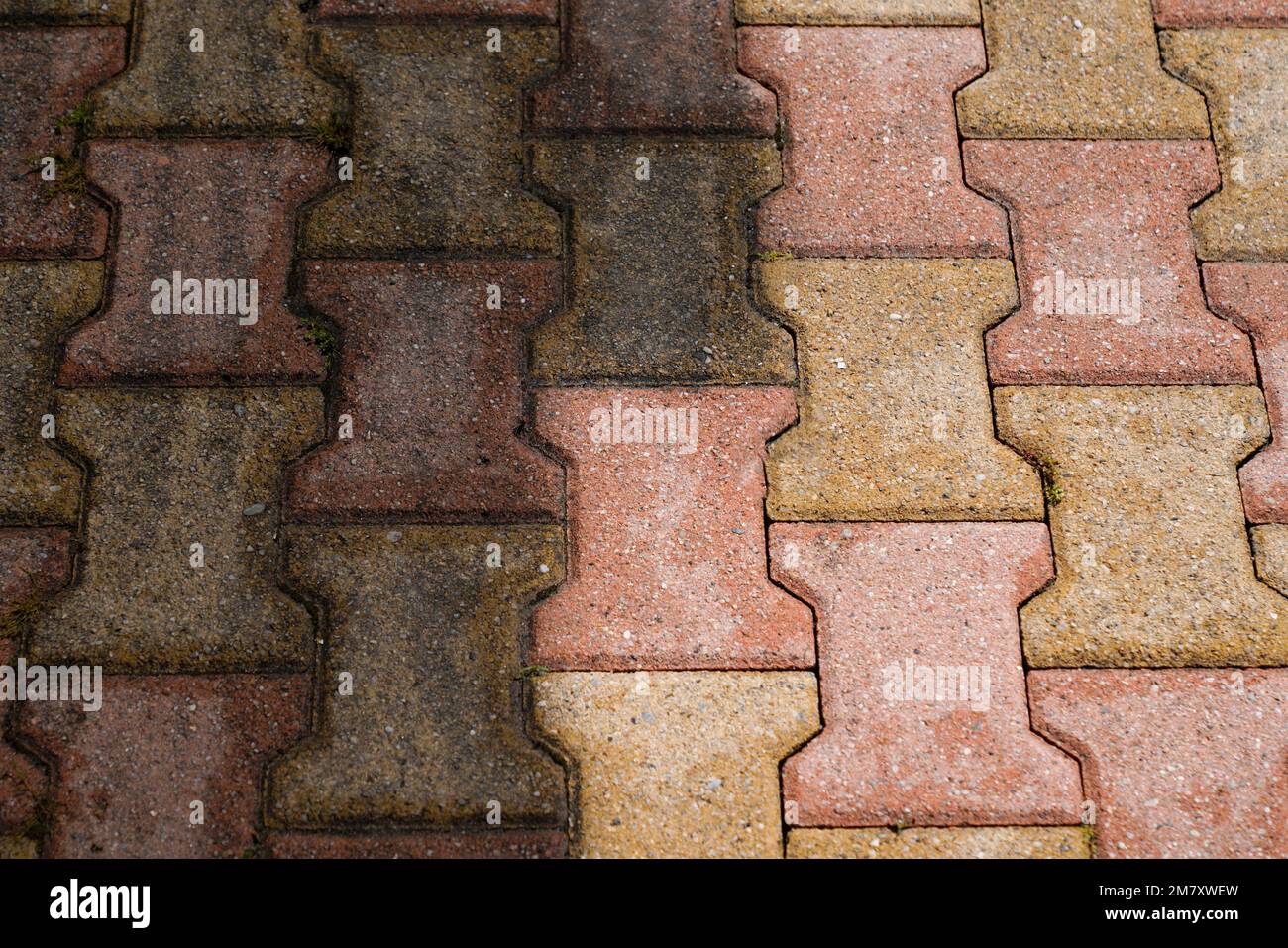 Contrast between auto block slab patio paving slabs floor dirty clean