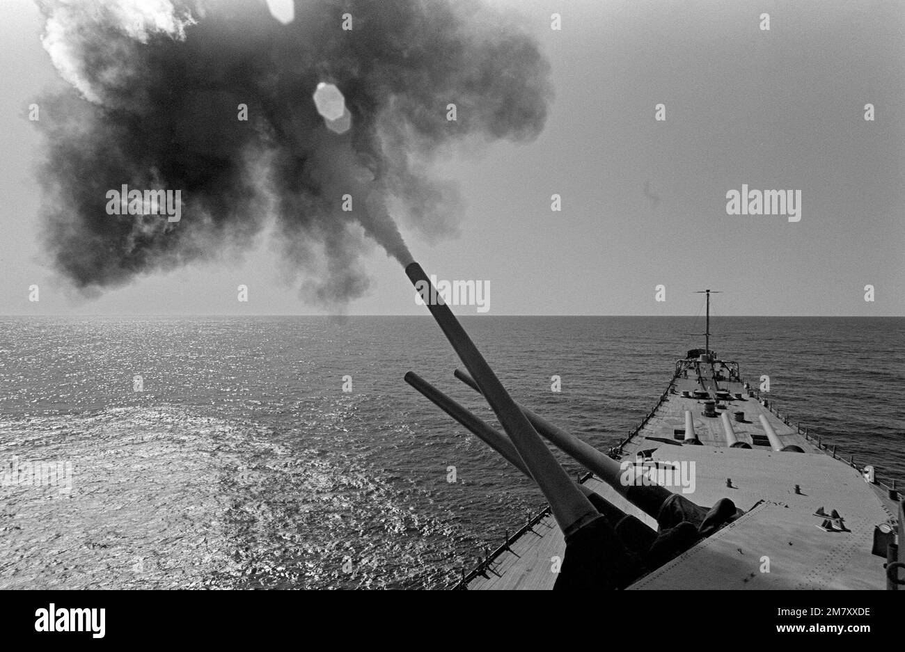 A closeup view of the 16inch/50caliber guns being fired aboard the