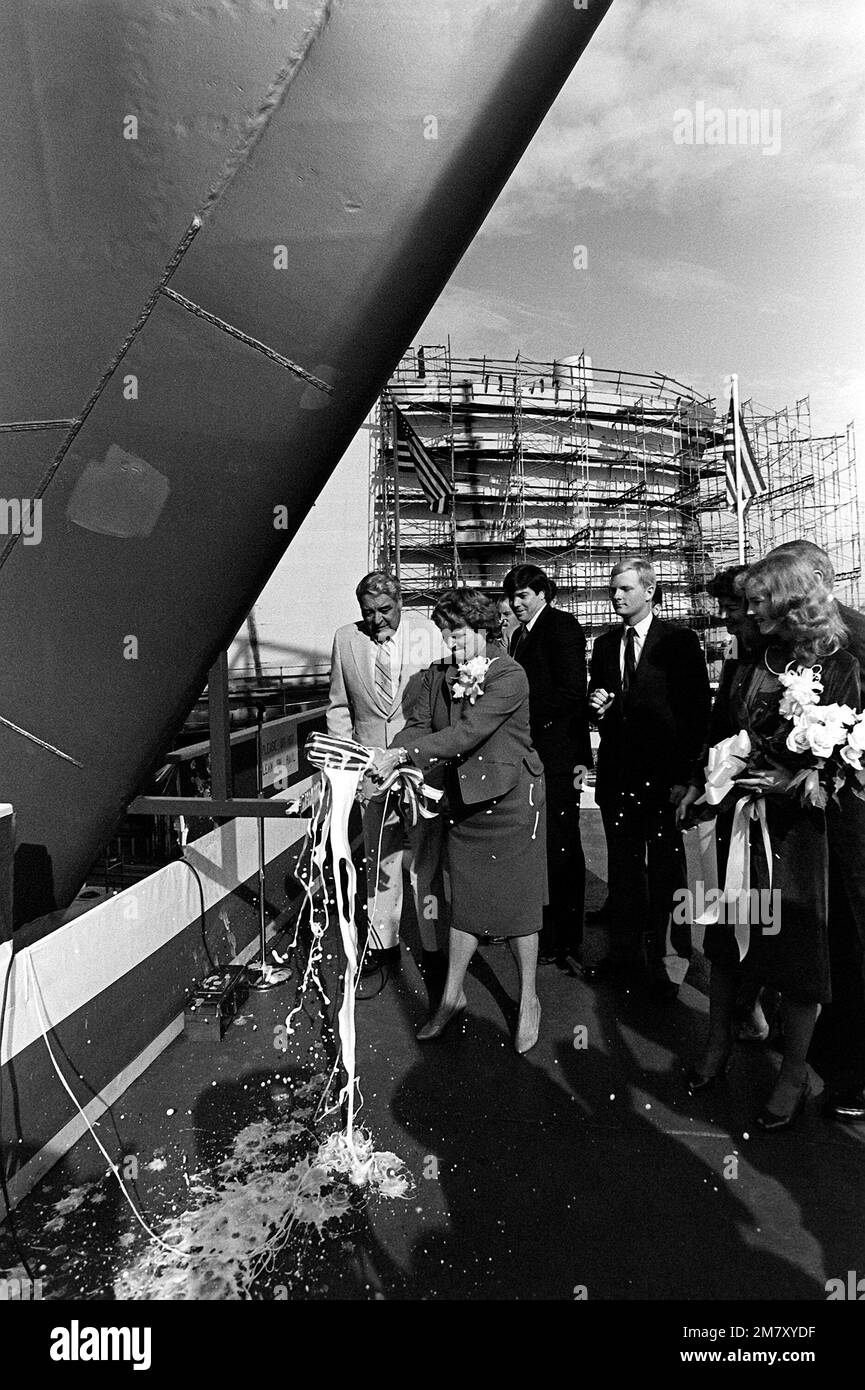 Ursula Meese, ceremony sponsor and wife of Edwin Meese III, christens of the cable repair ship USNS ZEUS (T-ARC-7) with a bottle of champagne to begin its slide down the ways. The launching ceremony took place at the National Steel and Shipbuilding Company. Base: San Diego State: California (CA) Country: United States Of America (USA) Stock Photo