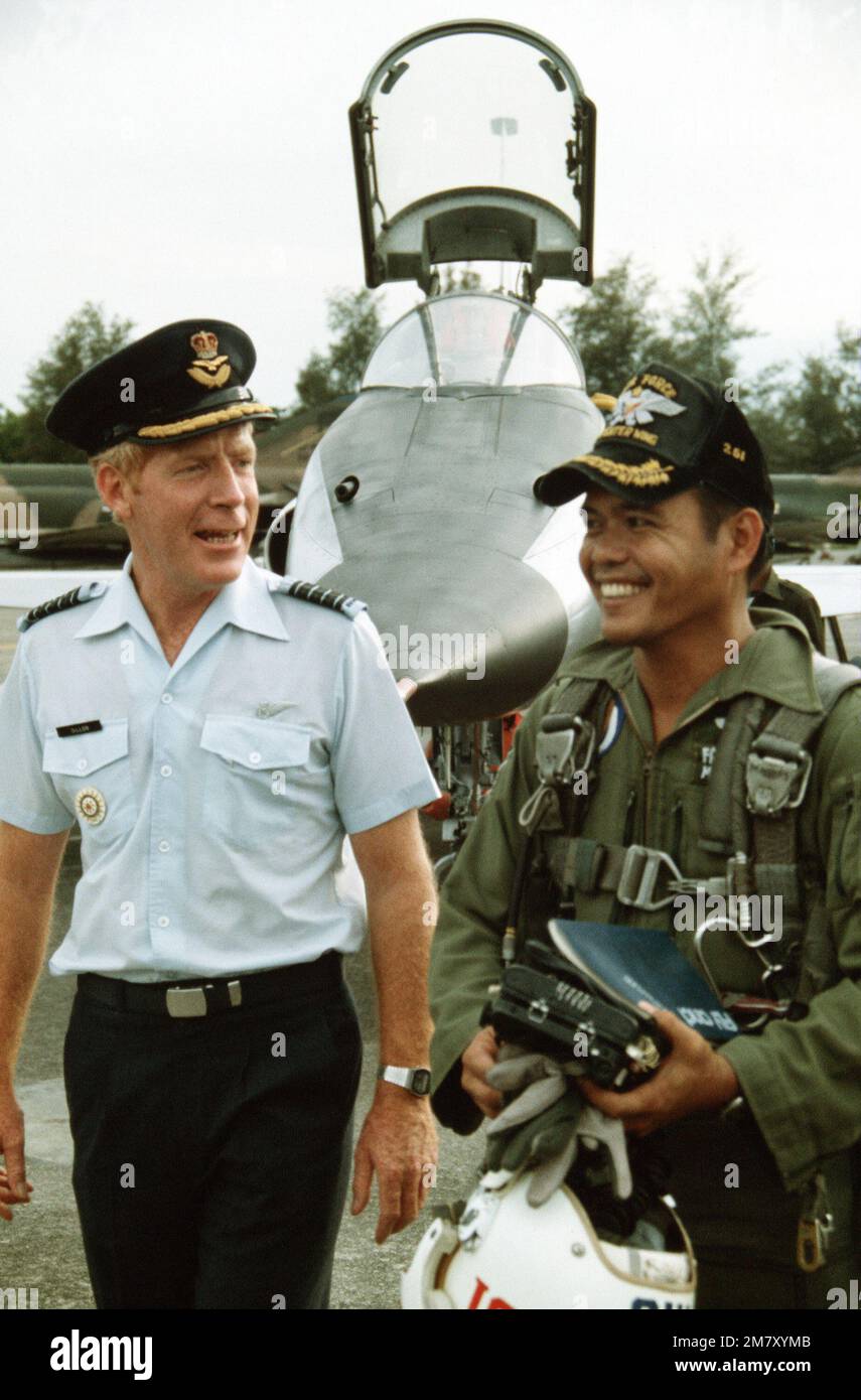 A Royal New Zealand Air Force officer discusses operations with a