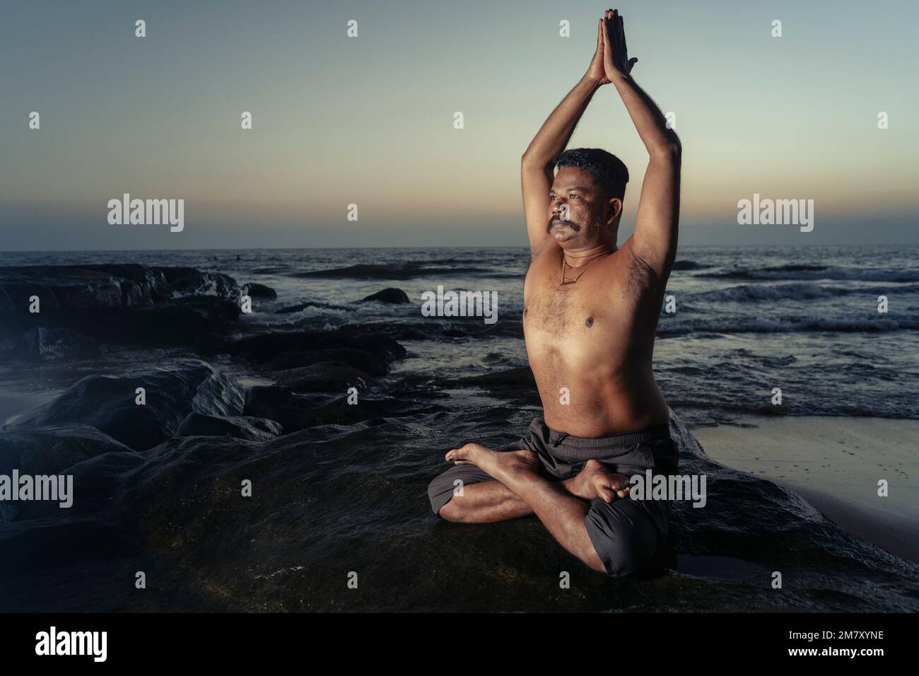 Indian Male Model Performing Yoga Posture Stock Photo