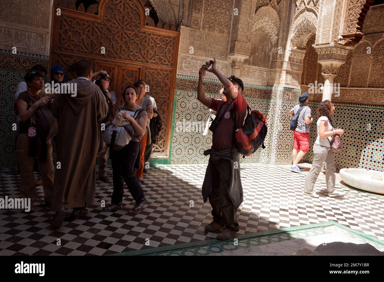 Fez, Morocco-April 23, 2014: Tourists in a Mosqe during a nice spring morning in the Medina of Fez Stock Photo