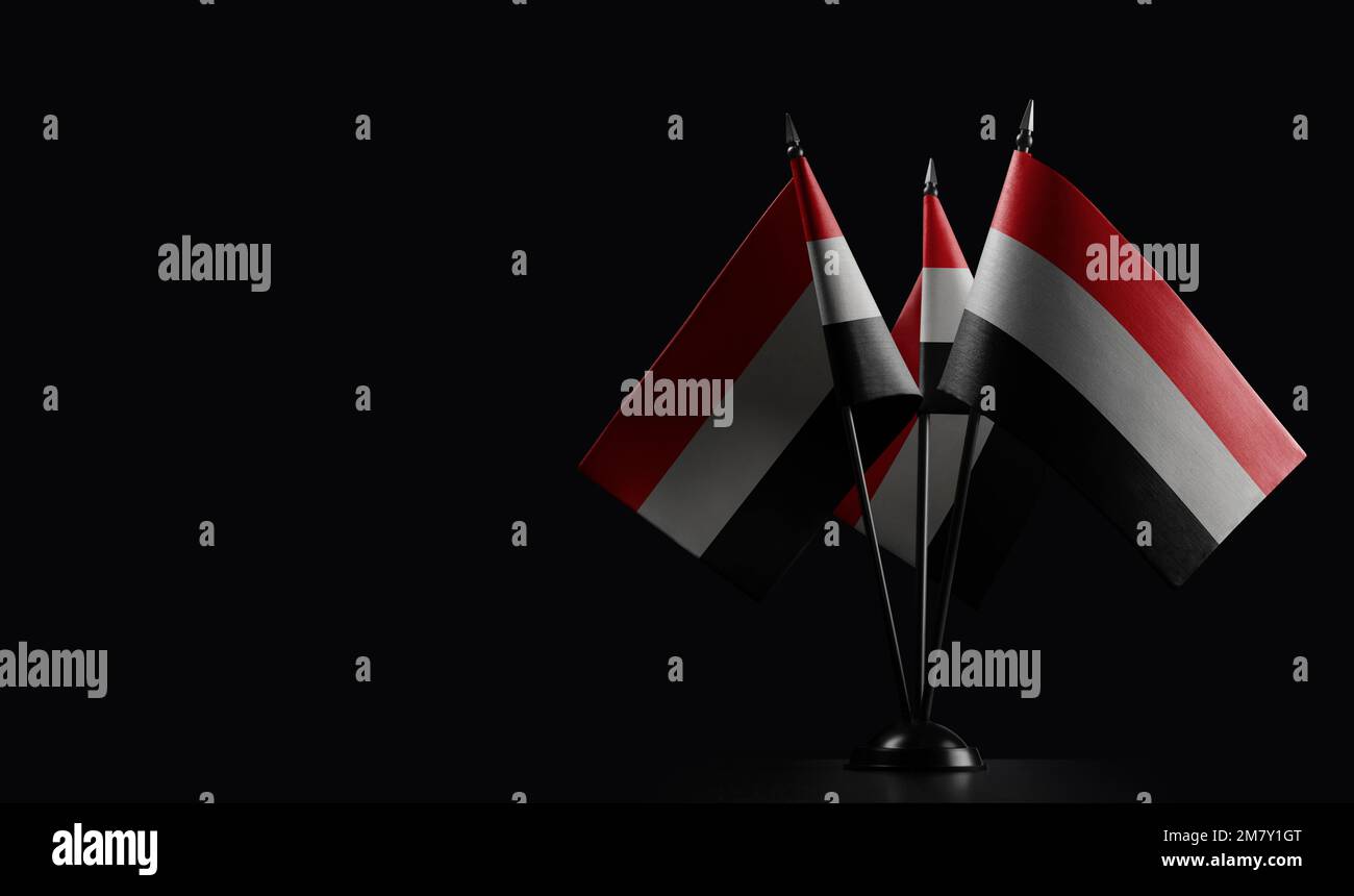 Small national flags of the Yemen on a black background Stock Photo - Alamy