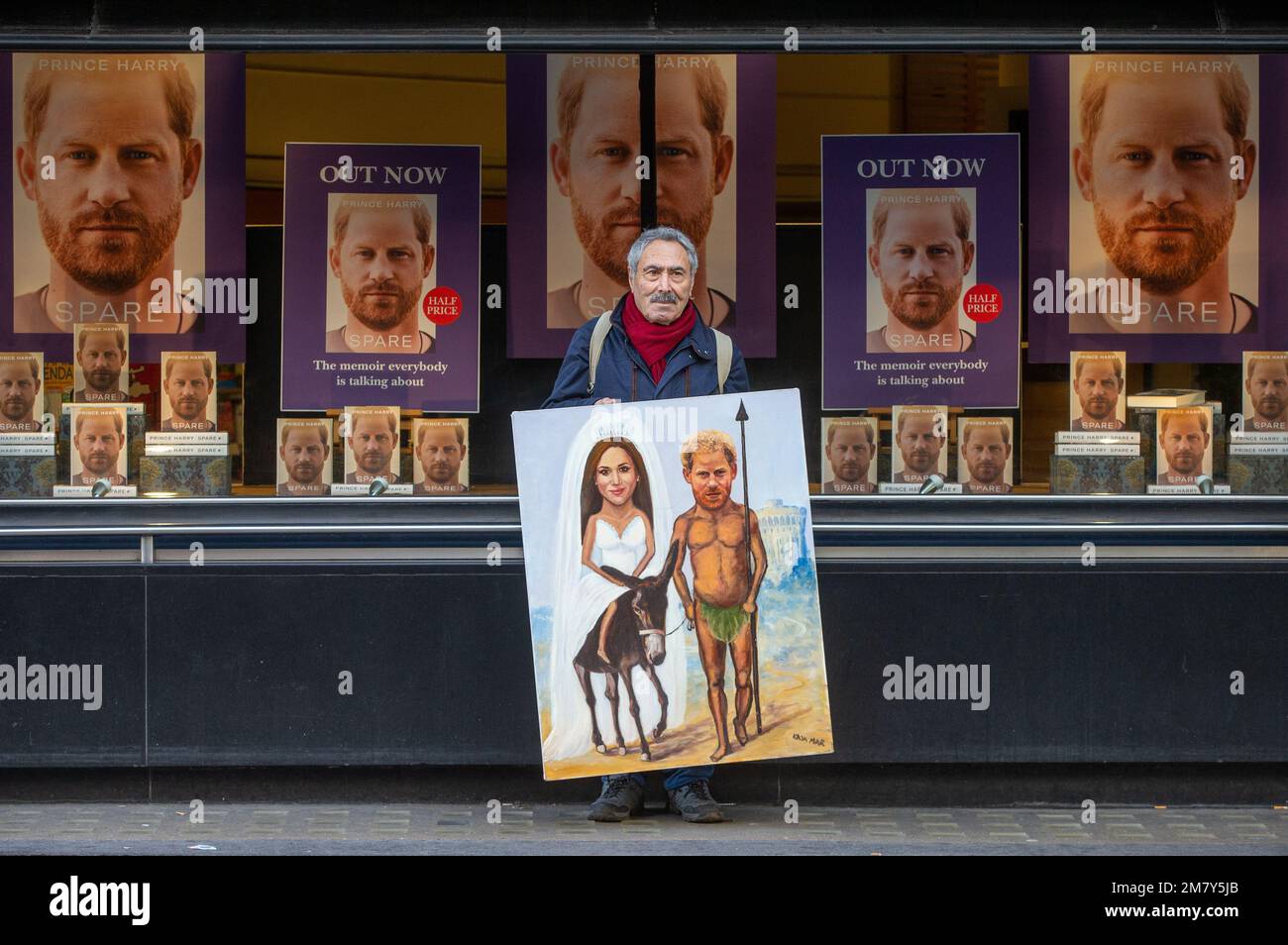 London, England, UK. 11th Jan, 2023. British artist KAYA MAR poses with his latest painting depicting Prince Harry as Don Quixote outside Waterstones bookstore where the royal's memoir Spare is on sale after being launched yesterday. (Credit Image: © Tayfun Salci/ZUMA Press Wire) EDITORIAL USAGE ONLY! Not for Commercial USAGE! Stock Photo