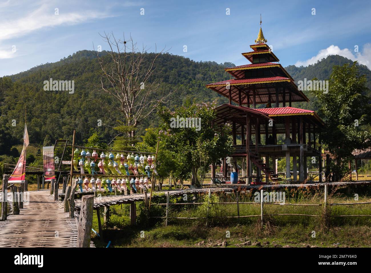 Pai, Thailand. November 21, 2022. Kho Ku So Bamboo Bridge over the rice fields in Pai, Norhern Thailand. Stock Photo