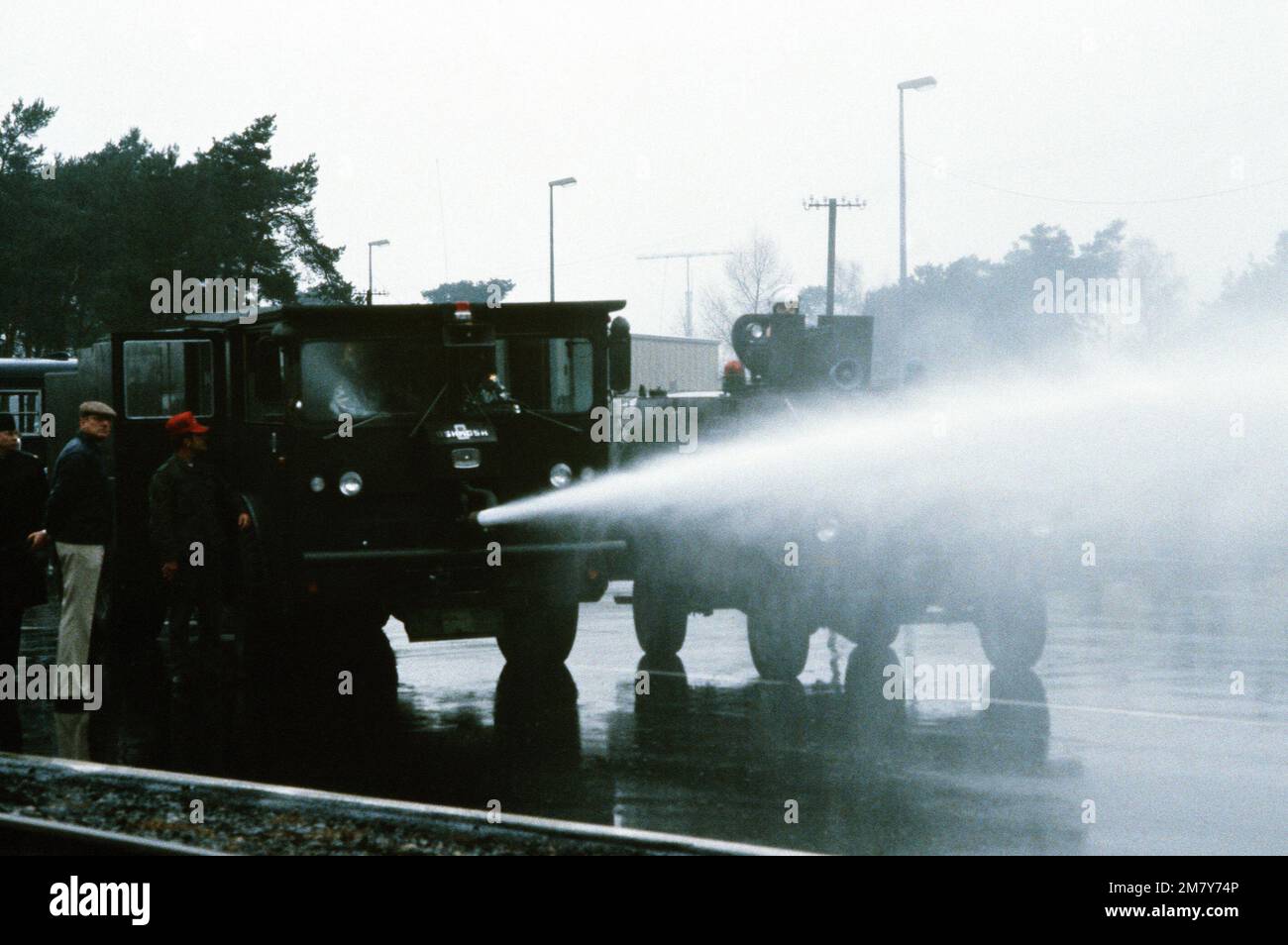A water cannon is tested prior to an expected demonstration against NATO's decision on Dec. 12, 1979, to deploy Pershing II and cruise missiles in Germany unless the Soviet's agree to scrap their nuclear weapons aimed at Western Europe. Base: Rhein-Main Air Base Country: Deutschland / Germany (DEU) Stock Photo