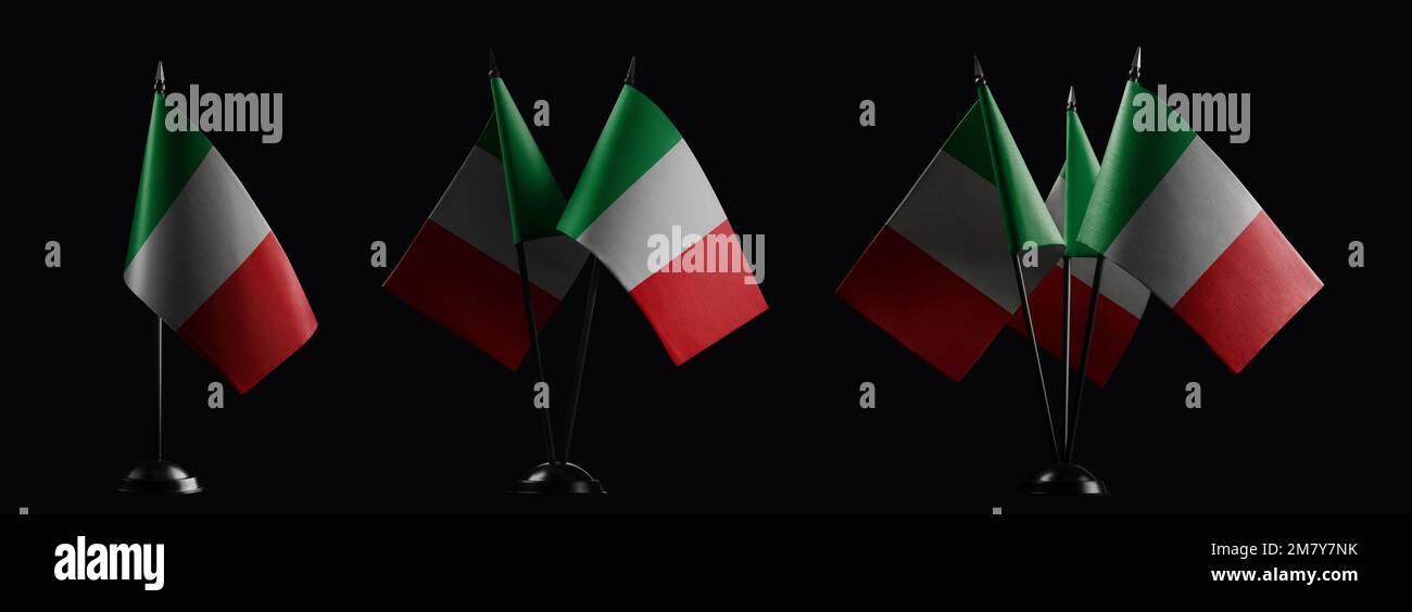 Small national flags of the Italy on a black background Stock Photo