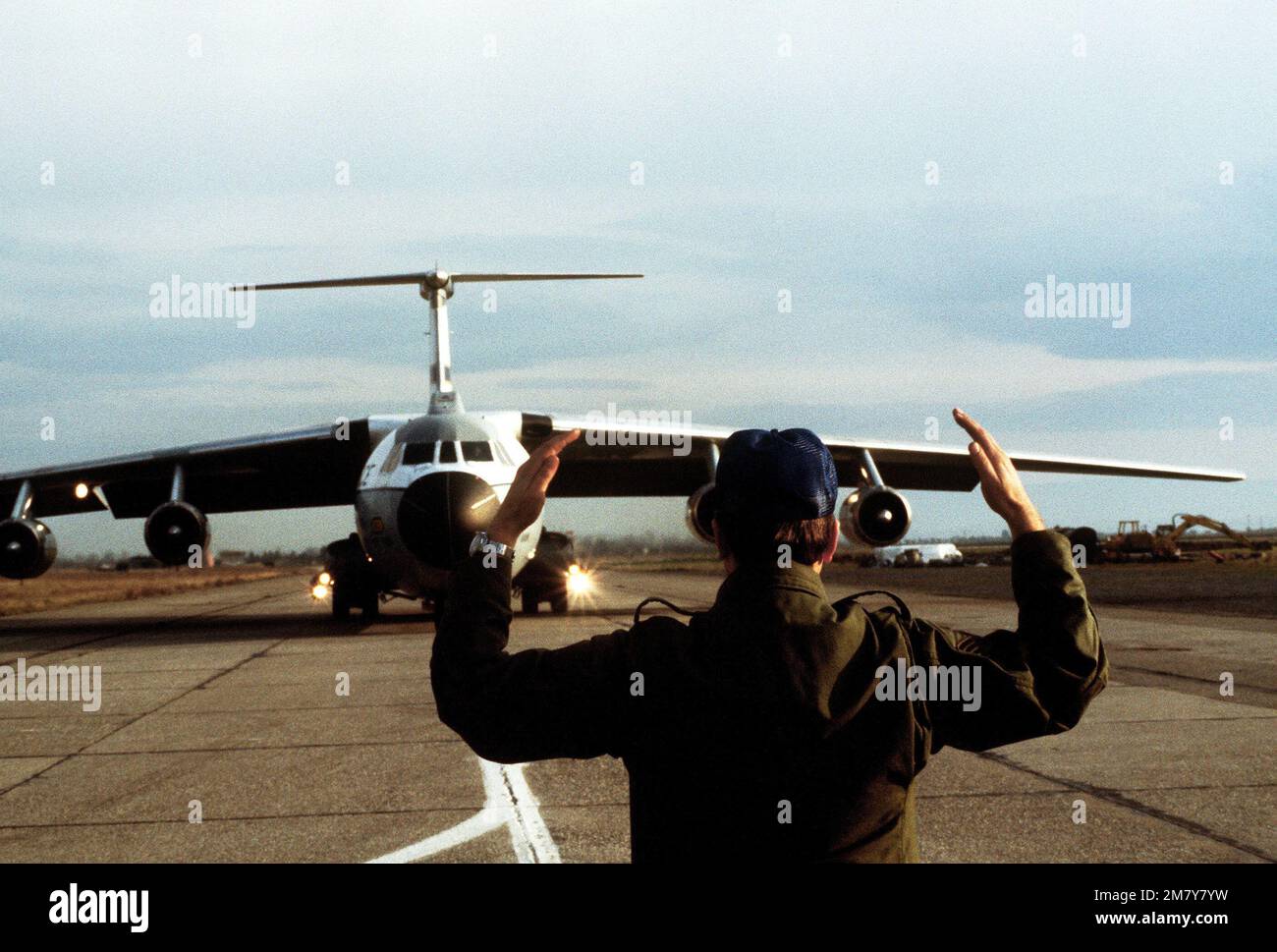 A C-141B Starlifter aircraft from the 437th Military Airlift Wing is ...