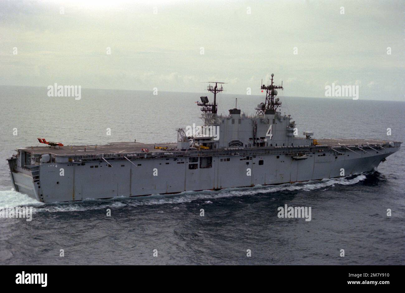 An aerial starboard quarter view of the amphibious assault ship USS ...