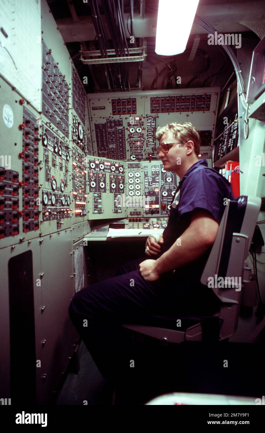 Gas Turbine System Technician 2nd Class (GS2) Steve Miller monitors the ...