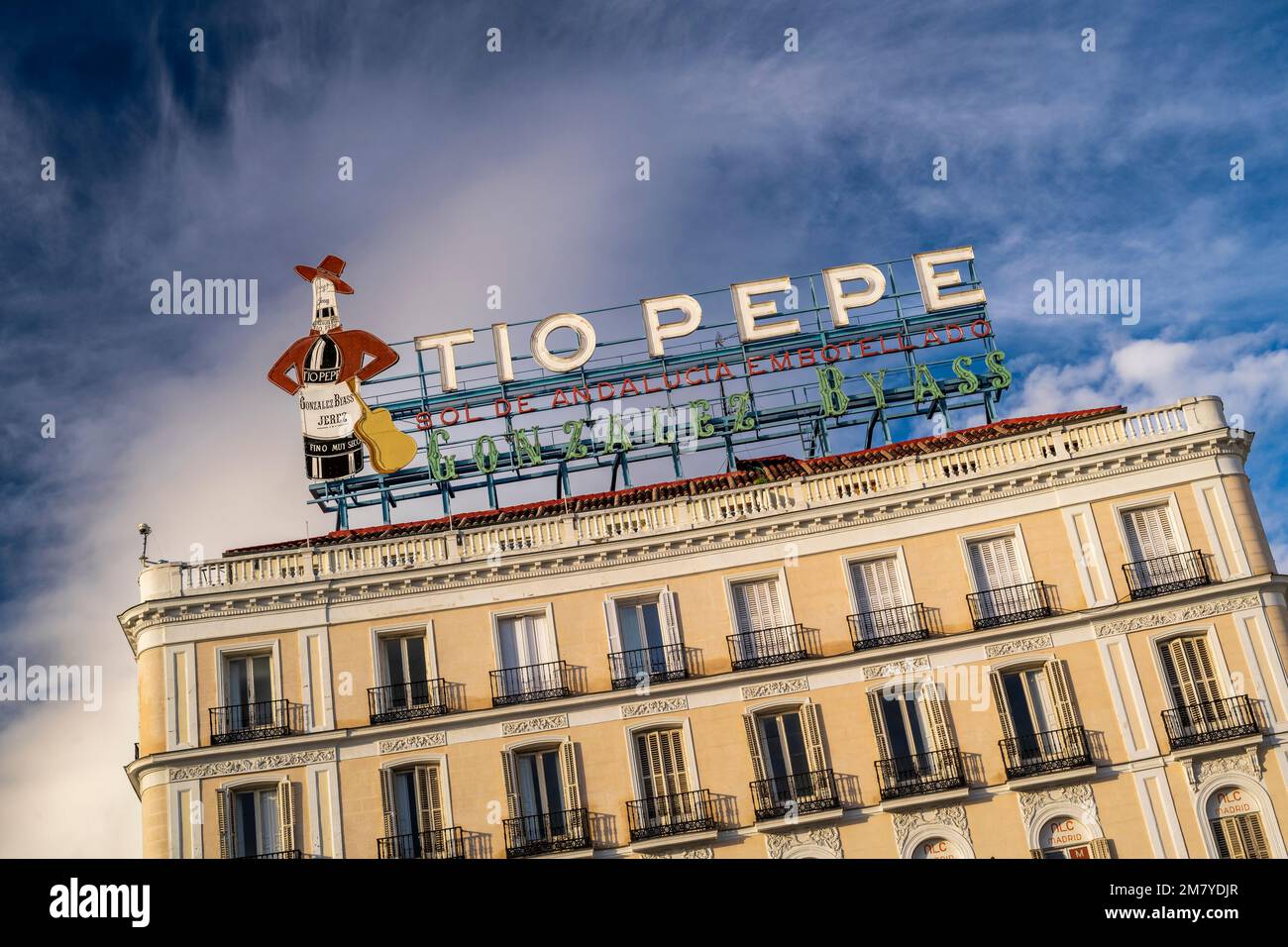Iconic 'Tio Pepe' neon sign, Puerta del Sol, Madrid, Spain Stock Photo