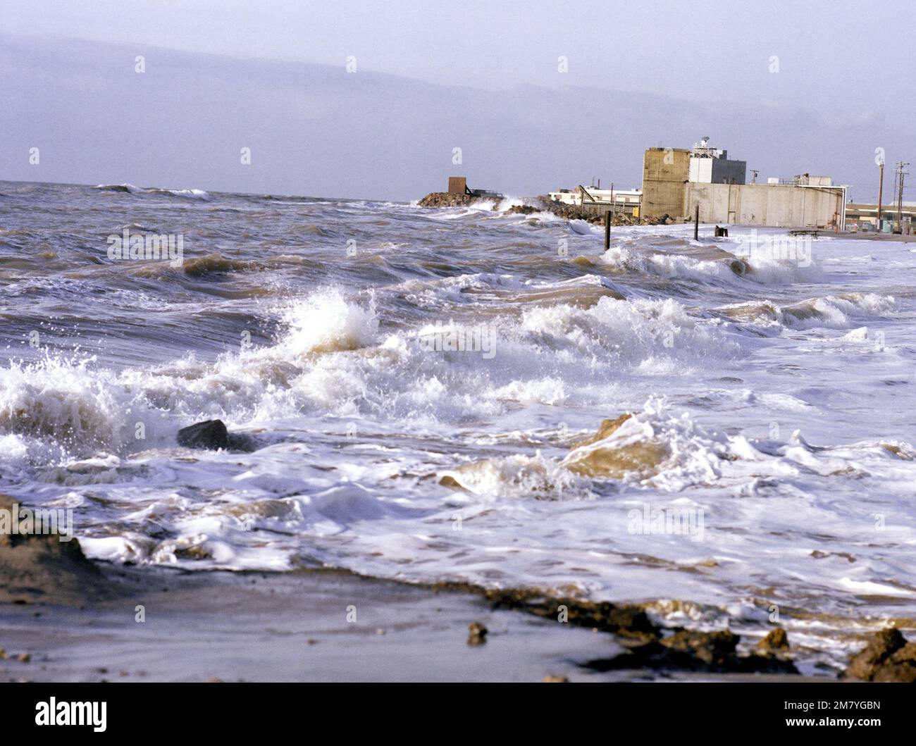 A view of damage caused to the beach area by high tides and heavy rains near the Officer's Club at the Pacific Missile Test Center. Base: Naval Air Station, Point Mugu State: California (CA) Country: United States Of America (USA) Stock Photo