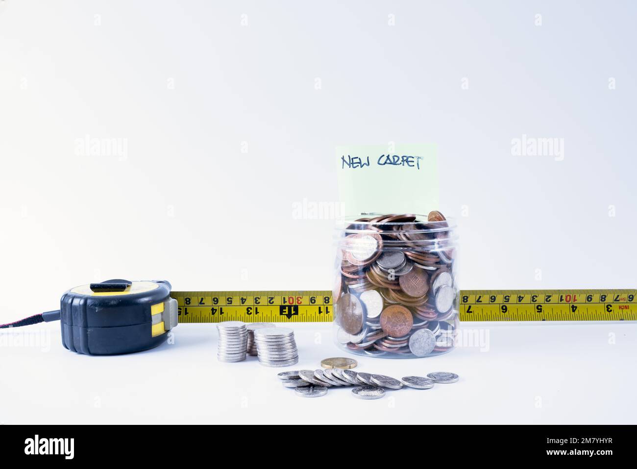 savings fund jar for house renovations budget concept Stock Photo