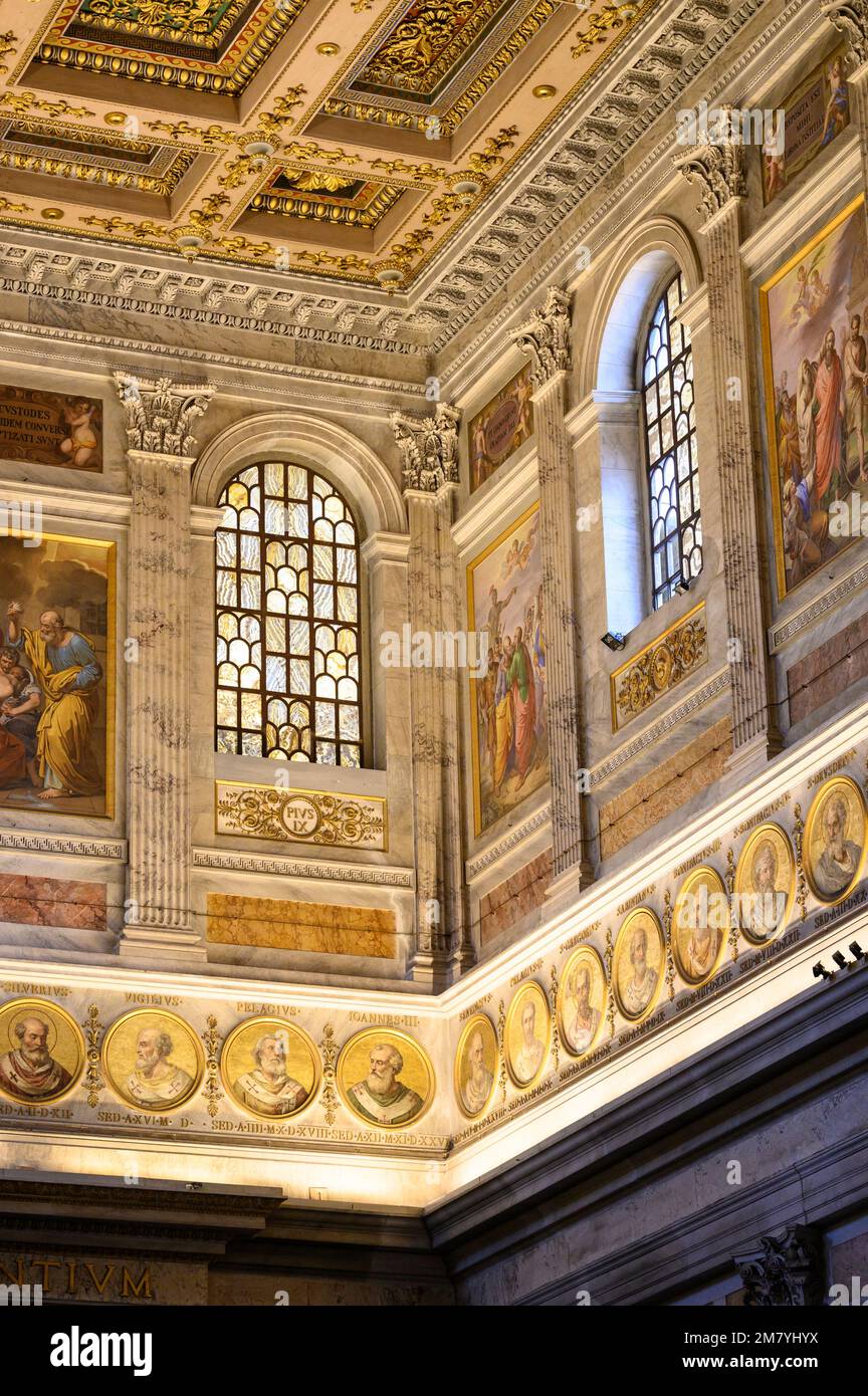 Rome. Italy. Basilica of Saint Paul Outside the Walls (Basilica Papale di San Paolo fuori le Mura). Alabaster windows and roundels with portraits of p Stock Photo