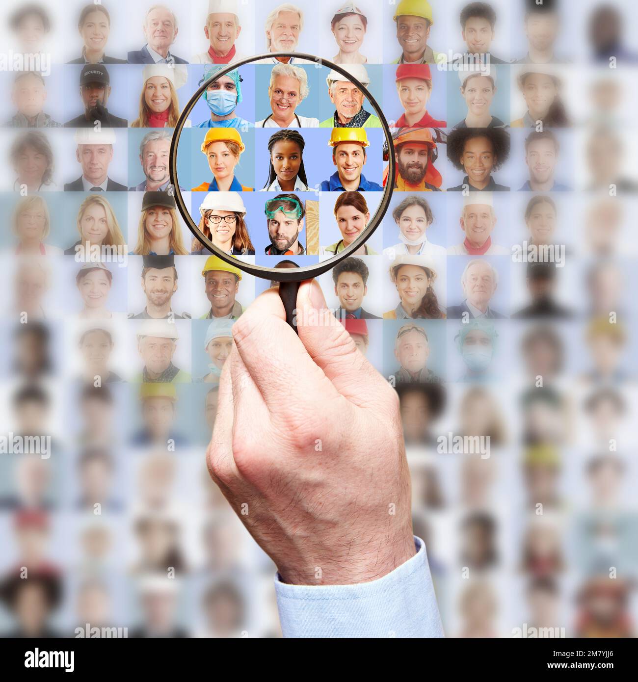 Job and personnel search concept with a magnifying glass that is looking for suitable personnel on the job market Stock Photo