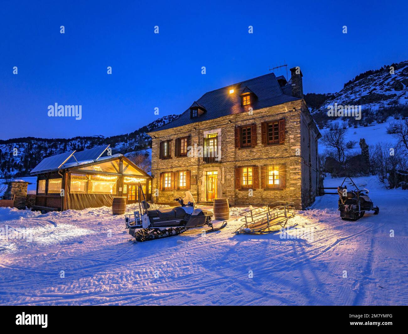 Montgarri hut and church at night in winter (Aran Valley, Catalonia, Pyrenees, Spain) ESP: Refugio y Santuario de Montgarri, una noche de invierno Stock Photo