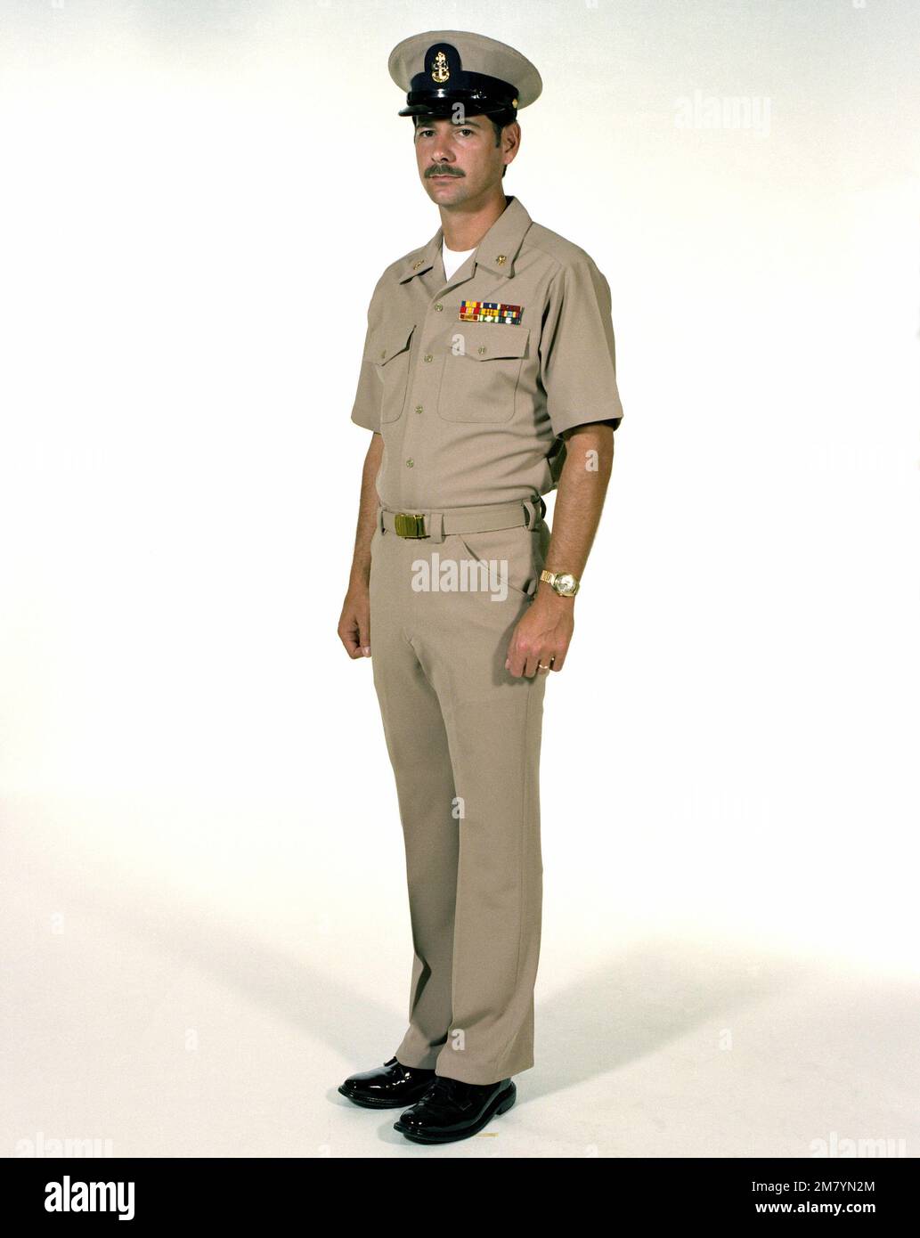 Uniform Summer khaki, male Navy chief petty officers. Country Unknown