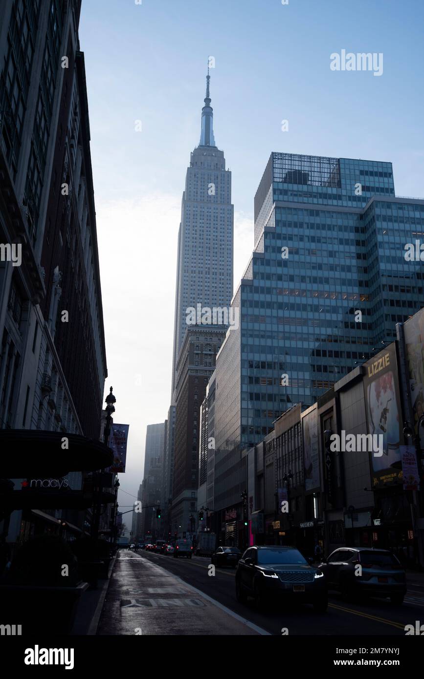Atmospheric view of the Empire State Building on 34th Street, Midtown Manhattan New York USA Stock Photo