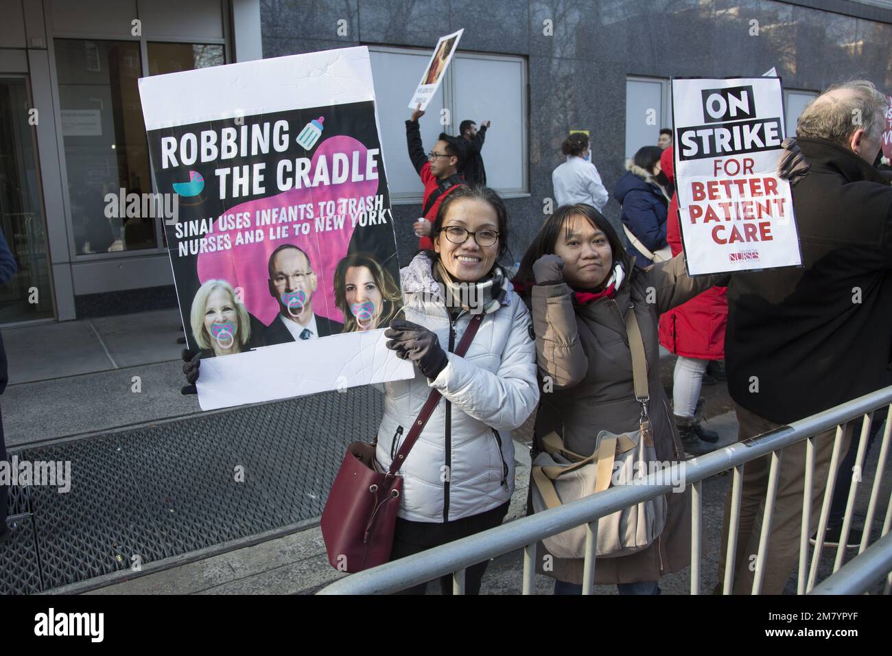 More than 7,000 nurses at Mount Sinai Medical Center and Montefiore Medical Center are seeking better wages and working conditions.   Hundreds of striking nurses and their supporters lined both sides of Madison Avenue in front of Mount Sinai Hospital on Monday January 9, 2023 waving signs, blowing horns and calling for a labor contract that will require more nurses at the bedside for patients. Stock Photo