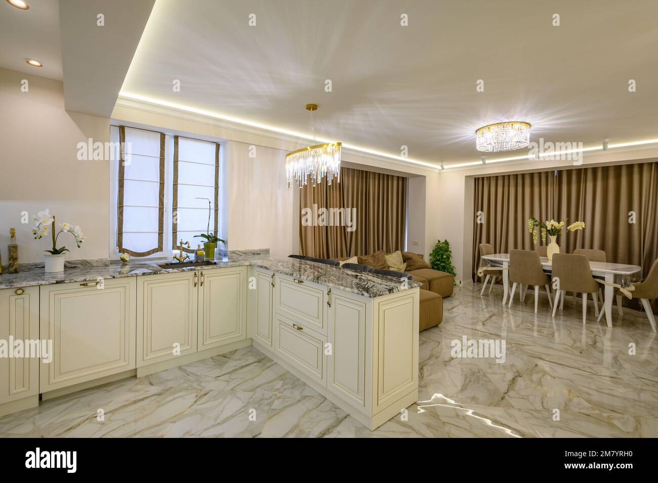 Studio apartment with inviting interior, featuring cream-colored ...