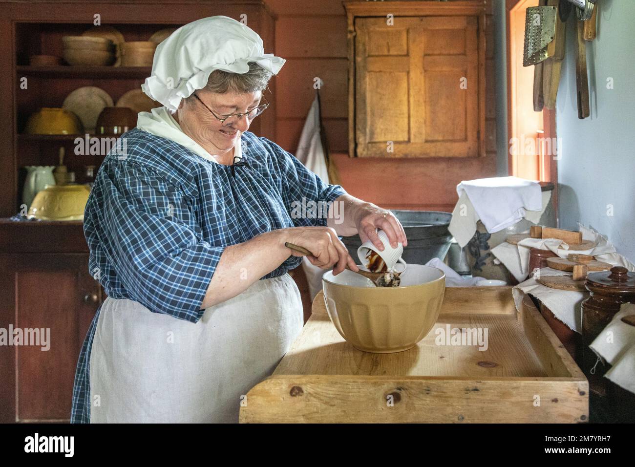 WOMAN MAKING A CHOCOLATE DESSERT, LINT FARM, KINGS LANDING, HISTORIC