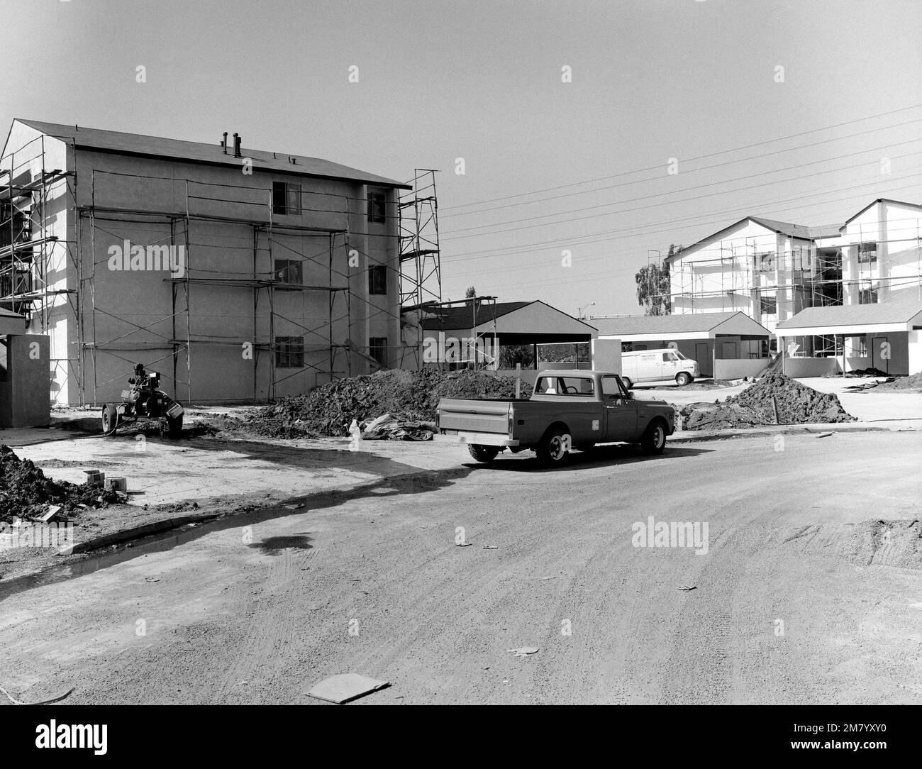 A view of new base housing facilities under construction. Base: Naval