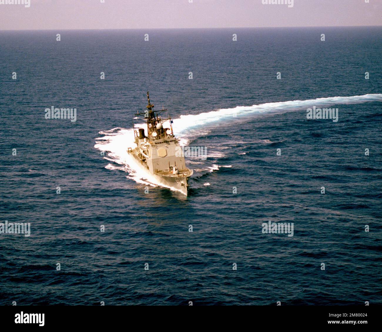 A starboard bow view of the Aegis guided missile cruiser USS ...