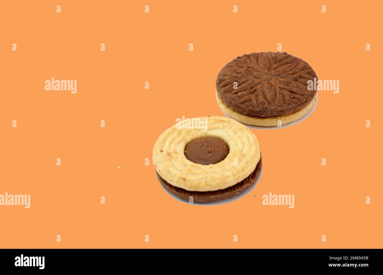 Chocolate sandwich cookies, baked biscuits stuffed with cocoa cream