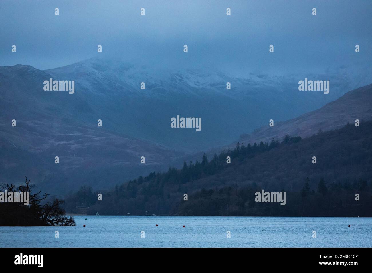 Lake Windermere Cumbria 11th January 2023 .UK Weather Afternoon snow on