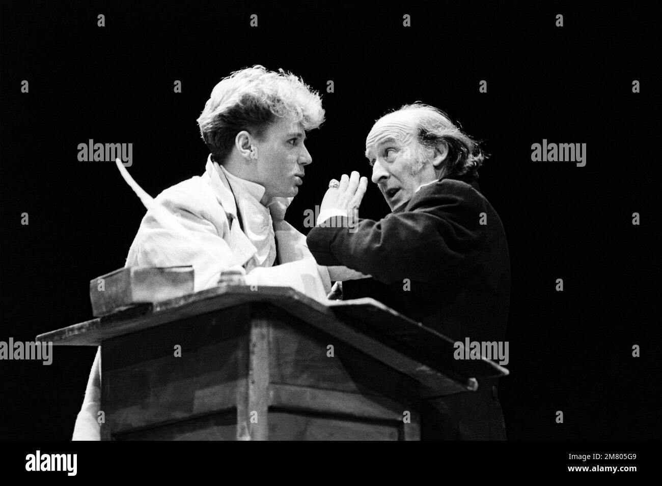 l-r: Ian McCurrach (Pip), Charles Lewsen (Wemmick) in GREAT EXPECTATIONS by Charles Dickens at The Old Vic, London SE1  02/01/1985  adapted & directed by Peter Coe  design: Peter Rice  lighting: Mark Henderson Stock Photo