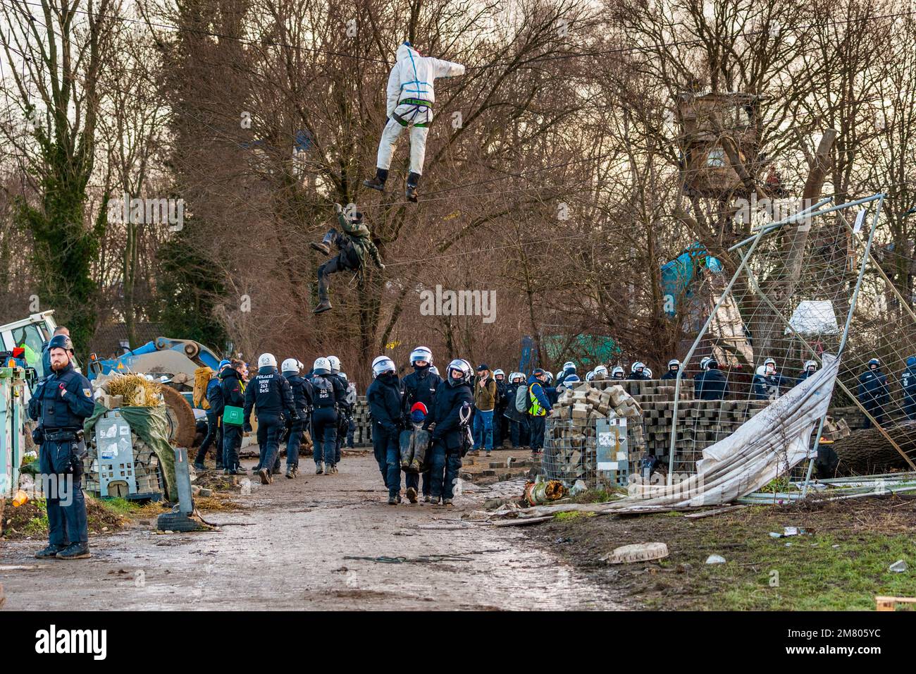 Activists have barricaded themselves in the German 'brown coal village' of Lutzerath in North Rhine-Westphalia. The activists have been occupying the village for more than two years to prevent it from being wiped off the face of the earth as agreed in a deal struck by the political. The energy company RWE mines lignite there, which activists blame for global warming and CO2 pollution. In the early morning, the police began to evacuate the village. Stock Photo