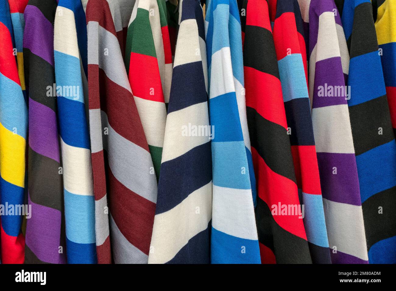 Abstract image of colourful striped University College rugby shirts for use as aa background texture Stock Photo