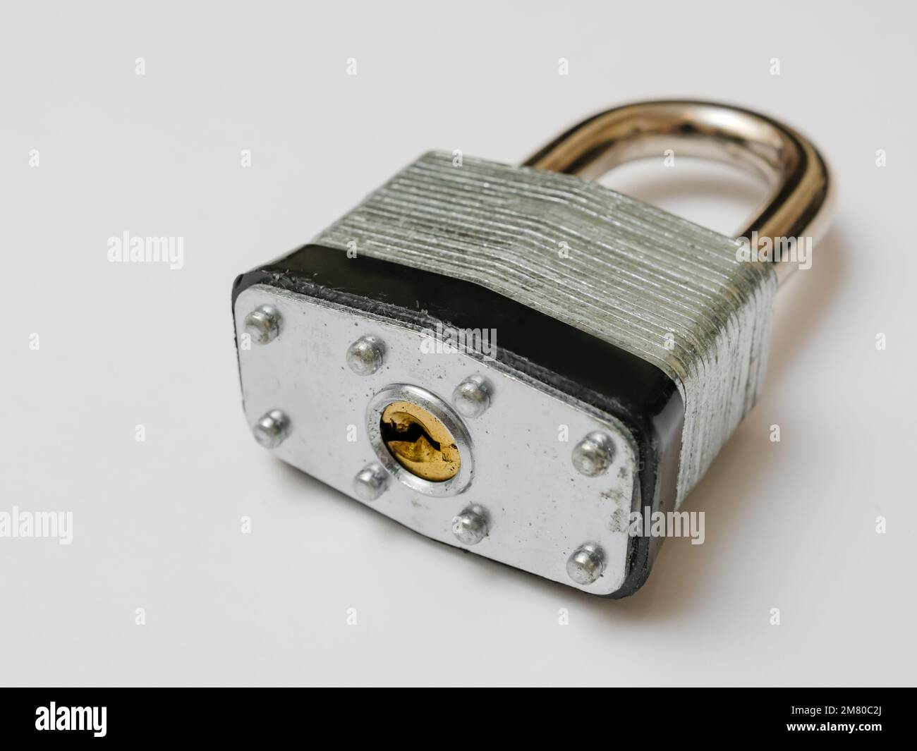 Locked padlock on white background. Stock Photo