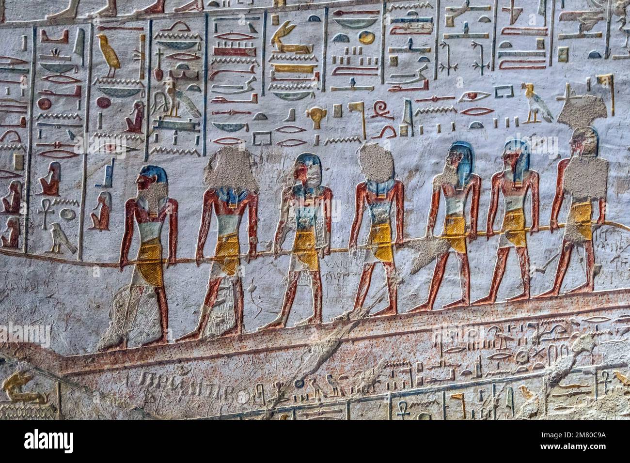 BAS-RELIEF AND FRESCOES PAINTED IN BRIGHT COLORS, EGYPTIAN HIEROGLYPHS, FIGURATIVE HOLY WRITINGS, TOMB OF THE PHARAOH MERENPTAH, VALLEY OF THE KINGS WHERE THE HYPOGEUM OF MANY PHARAOHS OF THE NEW EMPIRE CAN BE FOUND, LUXOR, EGYPT, AFRICA Stock Photo