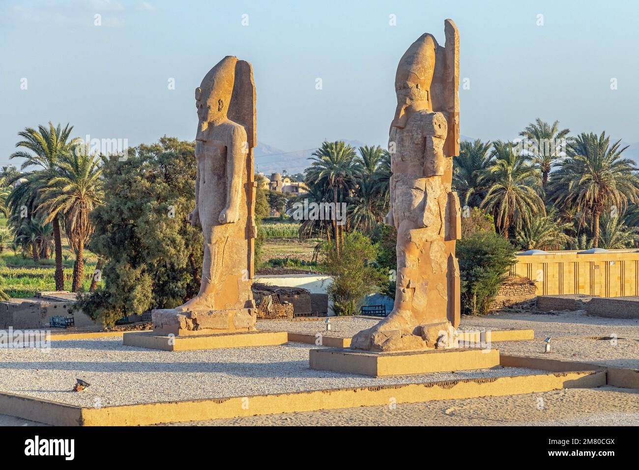 STATUES AT THE ENTRANCE TO THE RUINS OF THE FUNERARY TEMPLE OF PHARAOH MERENPTAH, VALLEY OF THE KINGS, LUXOR, EGYPT, AFRICA Stock Photo