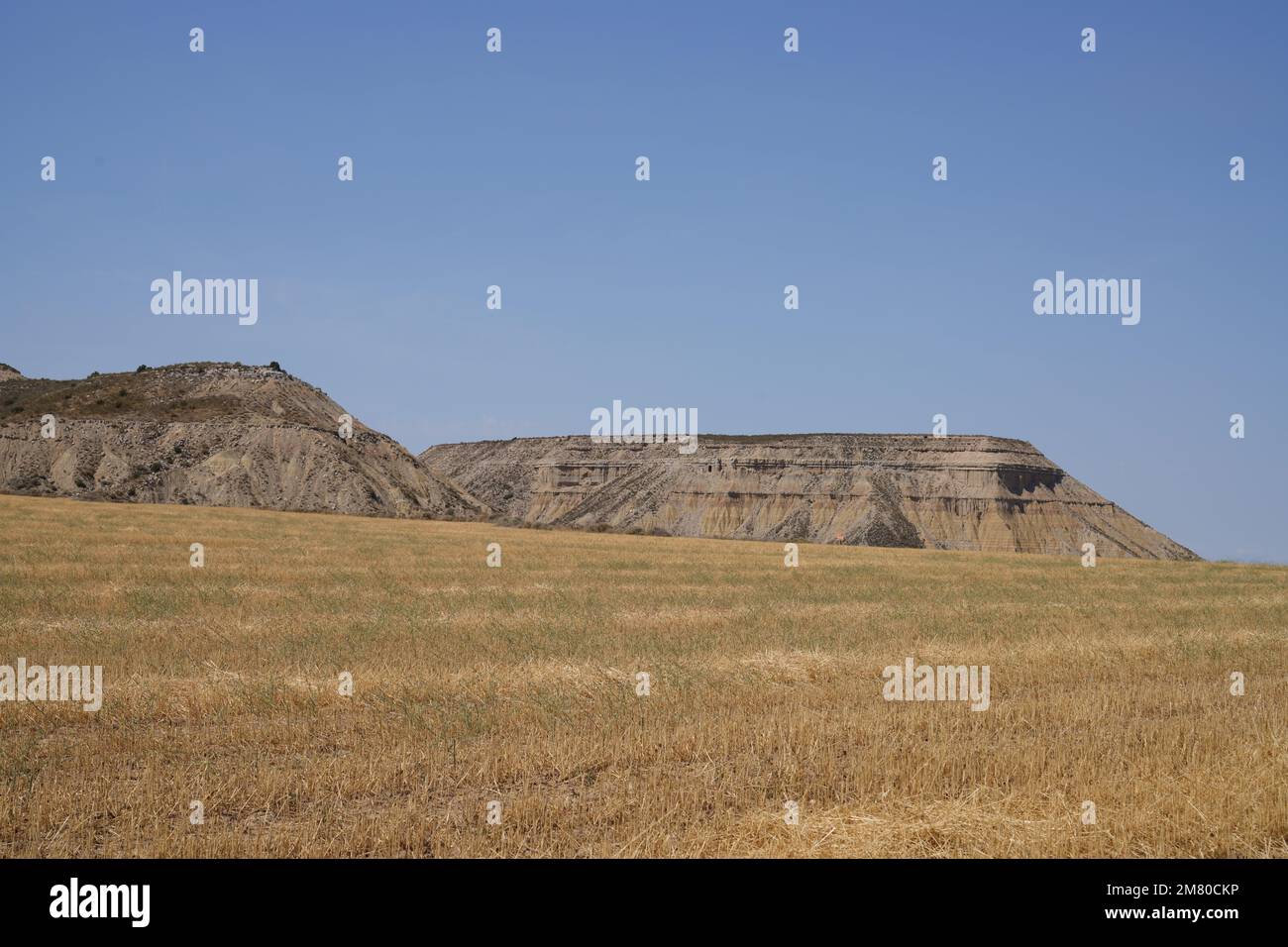 A Scenic View of great desert mountains under the blue sky Stock Photo ...